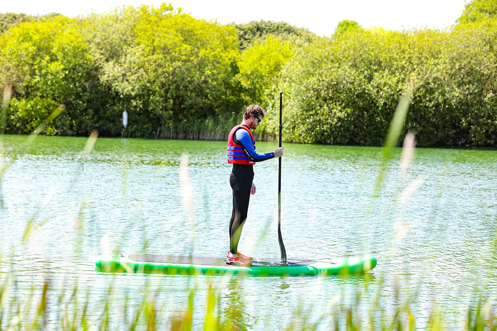 SUP Touring vs Surfing 2026 — How to Choose Your Board